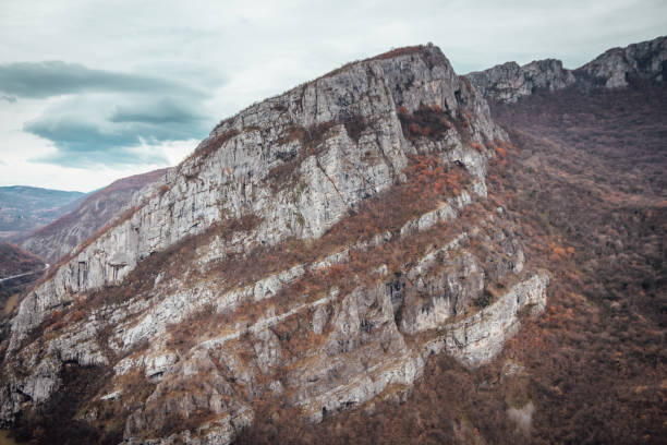istock Incredible mountain scene with majestic cliffs and clouds 1128749359