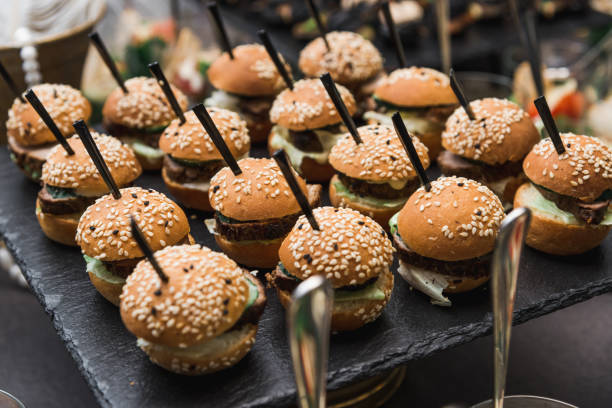 istock Small burgers served on one plate as appetizers 1128749940