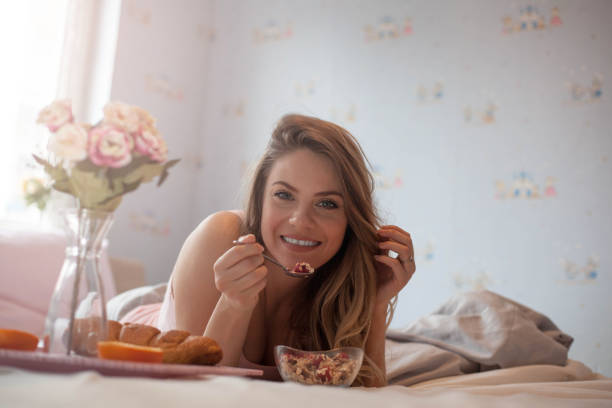 istock Beautiful woman in  bed. 1128755817