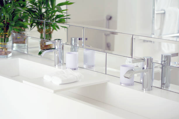 istock Modern white bathroom sink with faucet 1128757087