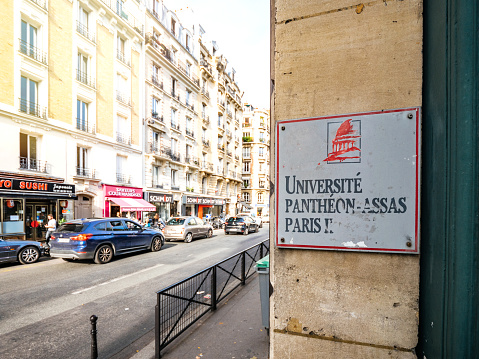 Paris: Street view of Pantheon-Assas University sign on the door entrance in 75006 Paris