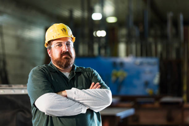 istock Mature man in metal fabrication plant 1128758726