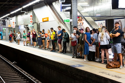Sydney, Australia - February 10, 2019: People waiting for the train at Town Hall subway in Sydney Australia