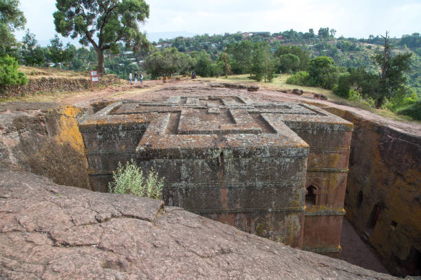 Ethiopia: Church of St. George in Lalibela The iconic Church of St. George (Biete Ghirogis) in Lalibela. Built in the late 12th or early 13th century AD, it is one of eleven rock-hewn monolithic churches that are now a UNESCO World Heritage Site. the church of saint george lalibela ethiopia stock pictures, royalty-free photos & images
