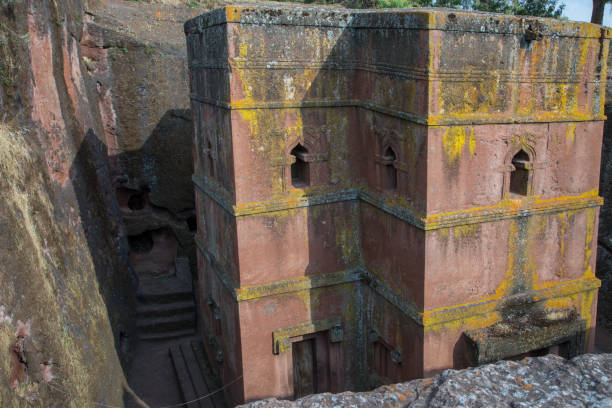 Ethiopia: Church of St. George in Lalibela The iconic Church of St. George (Biete Ghirogis) in Lalibela. Built in the late 12th or early 13th century AD, it is one of eleven rock-hewn monolithic churches that are now a UNESCO World Heritage Site. the church of saint george lalibela ethiopia stock pictures, royalty-free photos & images