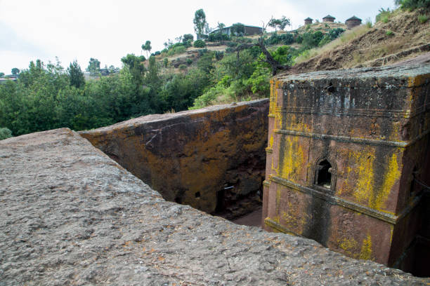 Ethiopia: Church of St. George in Lalibela The iconic Church of St. George (Biete Ghirogis) in Lalibela. Built in the late 12th or early 13th century AD, it is one of eleven rock-hewn monolithic churches that are now a UNESCO World Heritage Site. the church of saint george lalibela ethiopia stock pictures, royalty-free photos & images