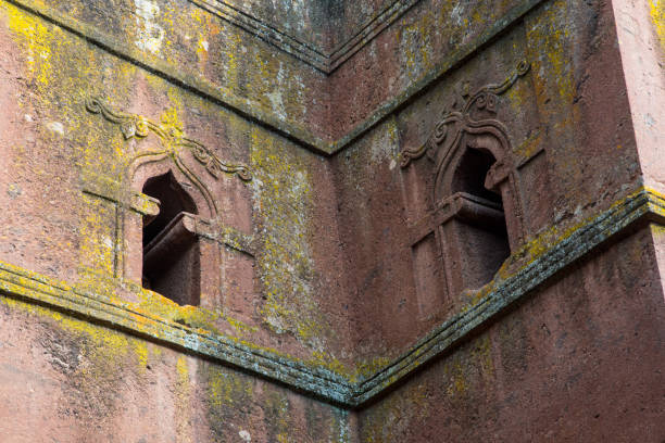 Ethiopia: Church of St. George in Lalibela Architectural detail of the iconic Church of St. George (Biete Ghirogis) in Lalibela. Built in the late 12th or early 13th century AD, it is one of eleven rock-hewn monolithic churches that are now a UNESCO World Heritage Site. the church of saint george lalibela ethiopia stock pictures, royalty-free photos & images
