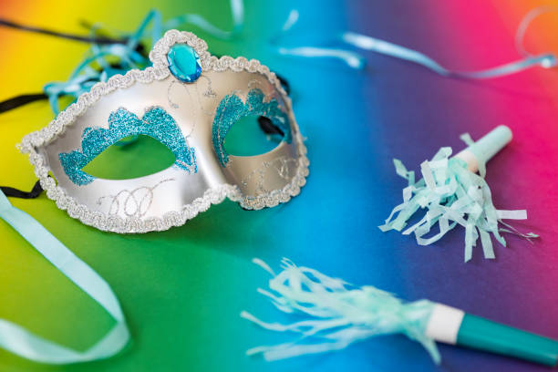 istock blue Venetian mask with paper trumpets 1128762841