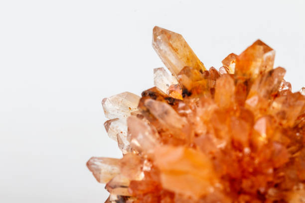 istock Macro of mineral stone Creedite on microcline on white background 1128763972