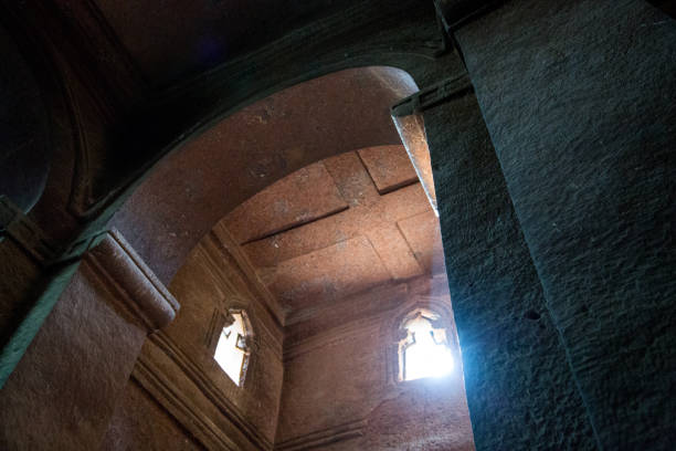 Ethiopia: Church of St. George in Lalibela The high ceiling of the Church of St. George (Biete Ghirogis) in Lalibela. Built in the late 12th or early 13th century AD, it is one of eleven rock-hewn monolithic churches that are now a UNESCO World Heritage Site. the church of saint george lalibela ethiopia stock pictures, royalty-free photos & images