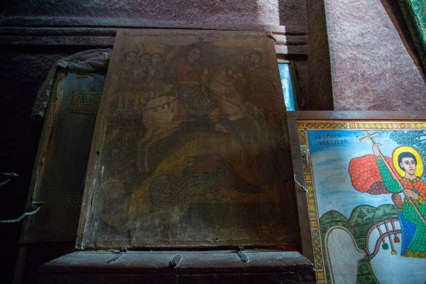 Ethiopia: Church of St. George in Lalibela Religious paintings decorate the iconic Church of St. George (Biete Ghirogis) in Lalibela. the church of saint george lalibela ethiopia stock pictures, royalty-free photos & images