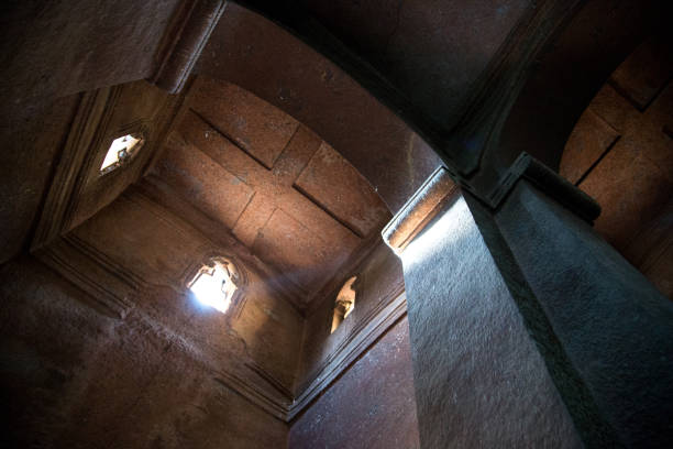 Ethiopia: Church of St. George in Lalibela The high ceiling of the Church of St. George (Biete Ghirogis) in Lalibela. Built in the late 12th or early 13th century AD, it is one of eleven rock-hewn monolithic churches that are now a UNESCO World Heritage Site. the church of saint george lalibela ethiopia stock pictures, royalty-free photos & images