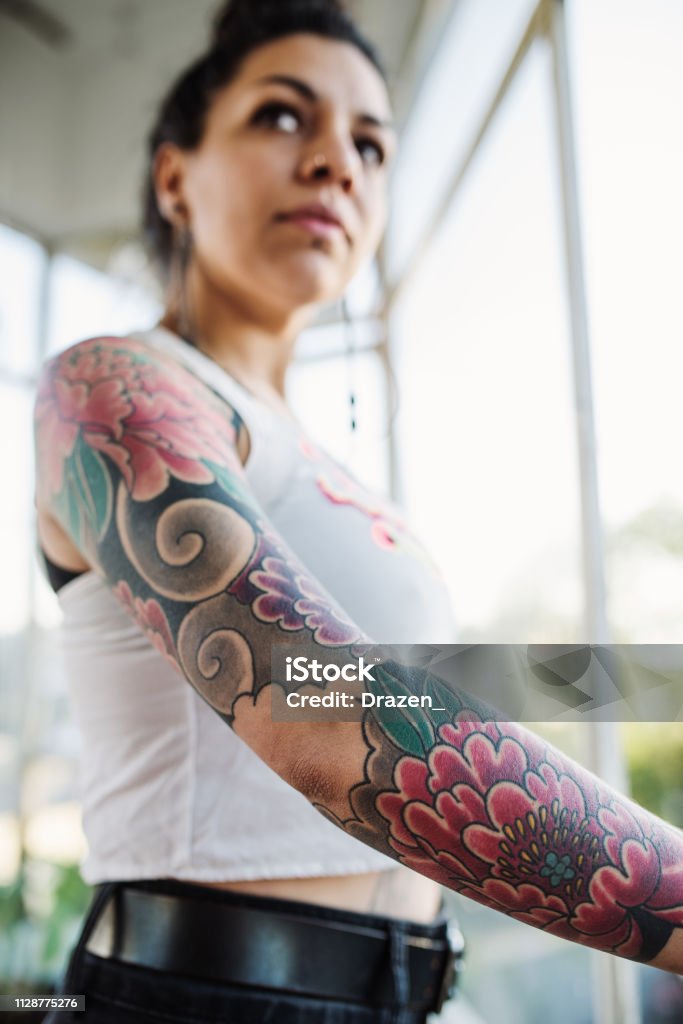 Portrait Of Beautiful Latina Mexican Millennial Woman With Tattoos Near  Window At Home Stock Photo - Download Image Now - iStock