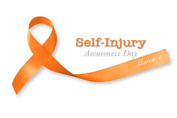 Photo of Self- injury awareness day SIAD, March 1, Orange ribbon isolated on white background.