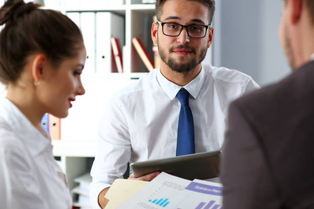 istock Handsome smiling bearded clerk man wearing glasses 1128781401