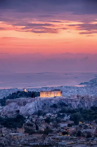 Acropolis and Athens cityscape at sunset