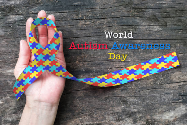 världsdagen för autism-medvetenhet med flerfärgade pussel menyfliken persons å - downs syndrome work bildbanksfoton och bilder
