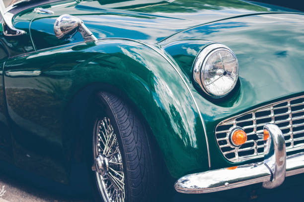 Headlights of a green vintage car