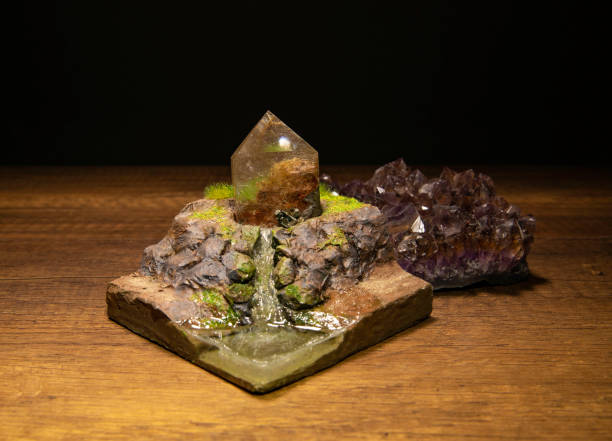 White Golden rutilated quartz on top of small water fall