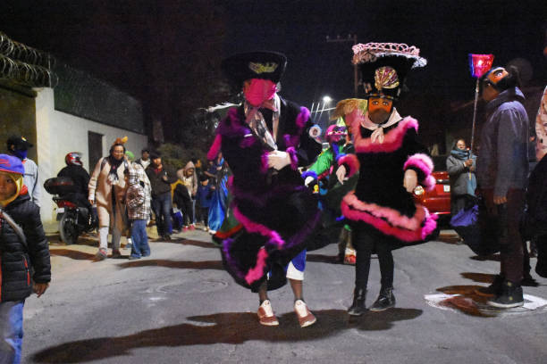 Posadas in San Gregorio Atlapulco, Mexico San Gregorio Atlapulco, Xochimilco/Mexico--December 24, 2018. Posadas are traditional celebrations that occur from December 16 through 25, commemorating Joseph and Mary's search for a place to sleep. Chinelos, traditionally costumed dancers, lead the procession to the church. la navidad stock pictures, royalty-free photos & images