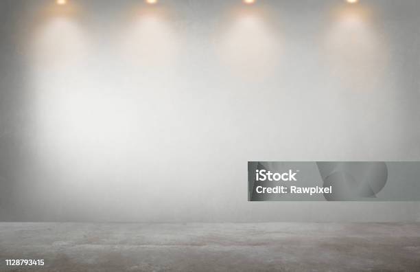Gray Wall With A Row Of Spotlights In An Empty Room Stock Photo - Download Image Now