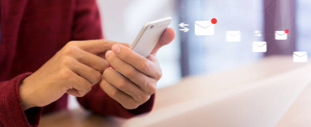 istock close up businessman hand touchscreen on smartphone device for receive unread e-mail list or send mail to partner and customer , virtual interface technology concept with virtual reality interface 1128794538