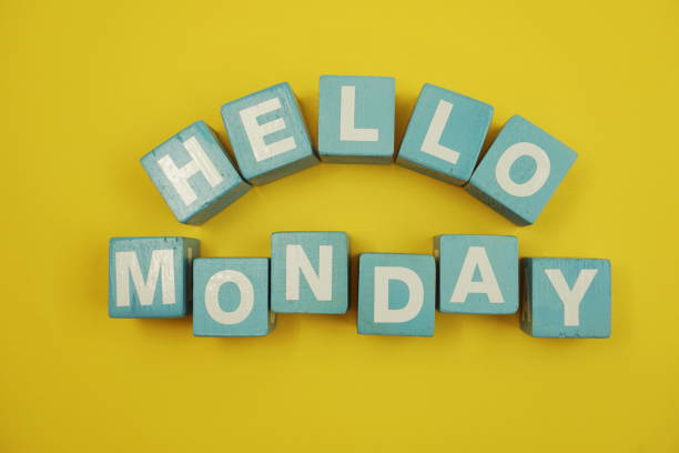 Hello Monday alphabet letters on yellow background