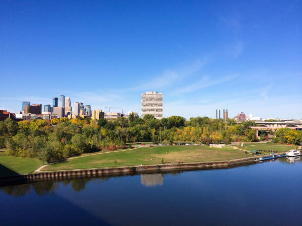 istock Minneapolis Skyline River And Golden Trees During Autumn 1128811158