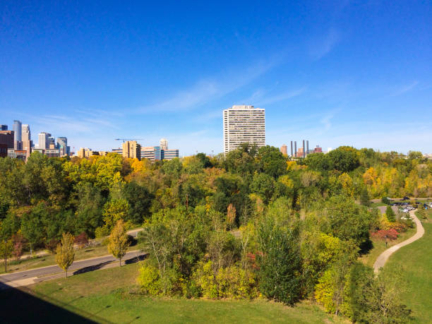 istock Minneapolis Skyline River And Golden Trees During Autumn 1128811163