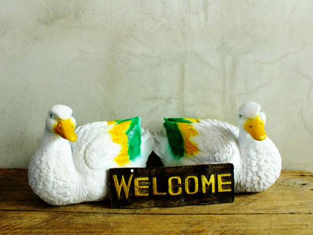 istock decorative ceramic duck interior decor ceramic statue with welcome sign 1128811417