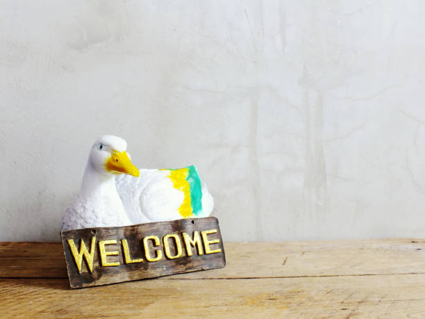 istock decorative ceramic duck interior decor ceramic statue with welcome sign 1128811442