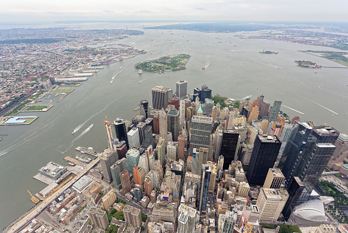 Wide-angle aerial view over Lower Manhattan, looking south towards Governors Island