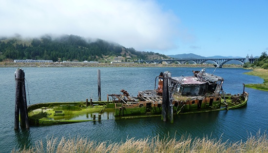 steamer and Isaac Lee Paterson bridge over Rogue River, Gold Beach, Oregon, USA