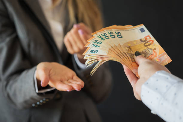 An official demanding bribe money