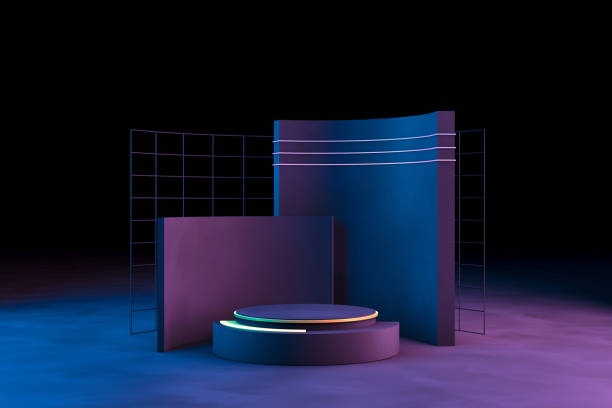 istock Blank product stand with neon lights on dark background 1128822000