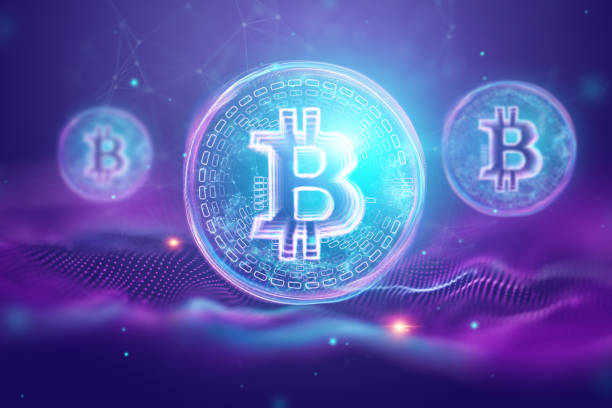istock Bitcoin hologram, ultraviolet creative background. Cryptocurrency, electronic money, blockchain technology, finance, copy space. 1128831077