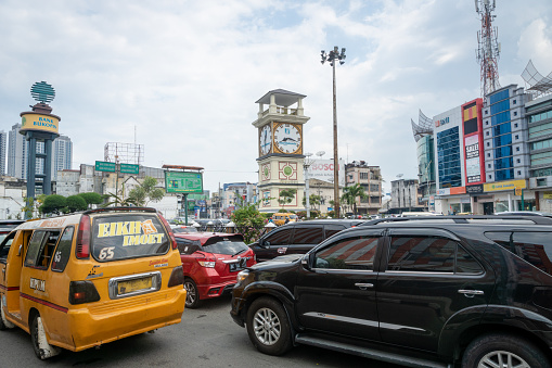 Medan, Indonesia - January 2018: Medan street and traffic in the central area in Medan, North Sumatra, Indonesia. Medan is the fourth biggest city by population in Indonesia.