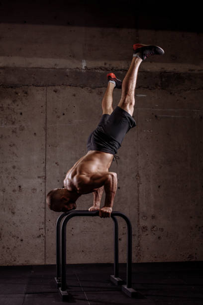 istock sportsman is building triceps strength during workout at gym 1128844429