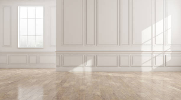 istock Perspective of the sun light cast the shadow on white empty room and bright laminate wood floor,classic interior style.blank space architecture. 1128845549