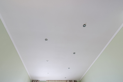 Lined false ceiling in the room