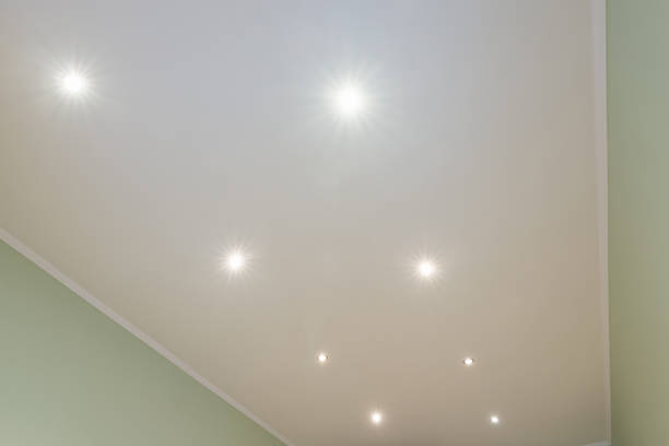 istock Ceiling in the room with spotlights installed and turned on 1128847702