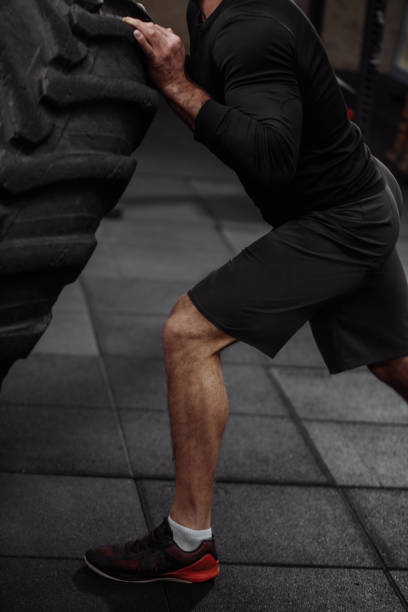 istock close up side view cropped photo of a brutal man developing his muscles 1128847785