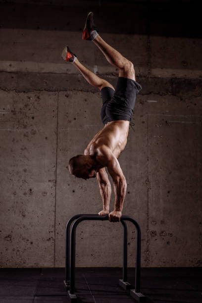 istock handstand training in the sport center 1128848199