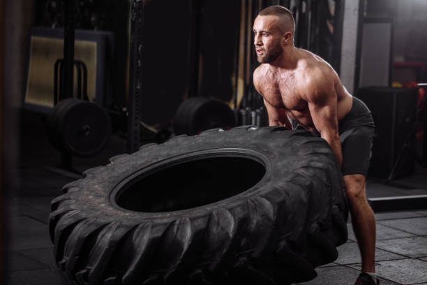 istock fit man in shorts is keeping fit 1128851569