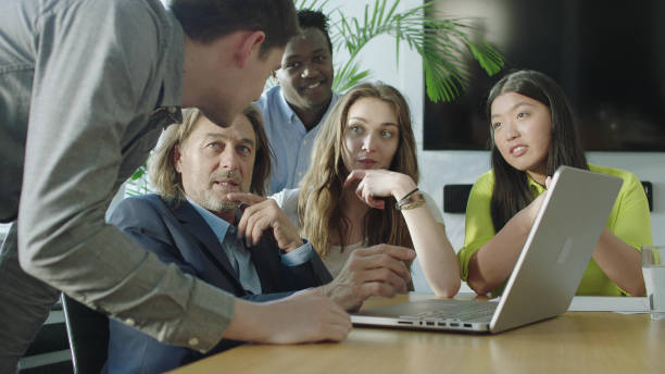 istock Consultations with mentor. Success in startup company 1128856790