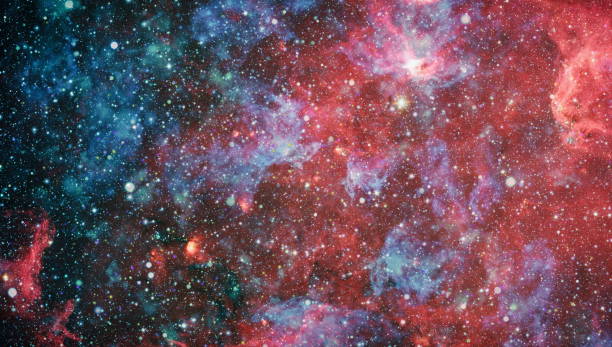 istock Nebula night starry sky in rainbow colors. Multicolor outer space. deep space many light years far from planet Earth. Elements of this image furnished by NASA. - Image 1128857295