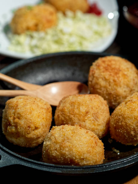 istock Homemade vegan arancini (risotto balls) 1128857647