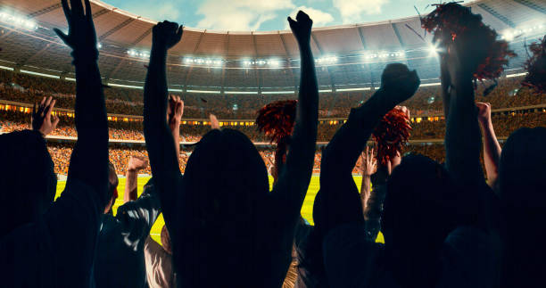 istock Fans cheering for sports team 1128858892