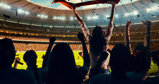 istock Fans cheering for sports team 1128858902