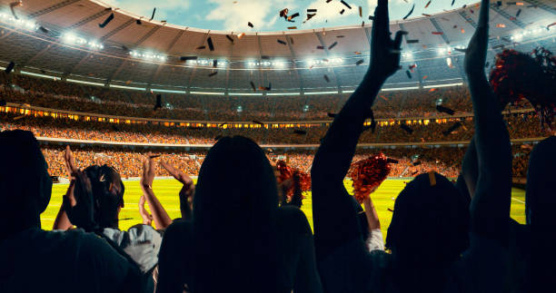 istock Fans cheering for sports team 1128858904